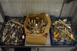 A large quantity of plated cutlery.