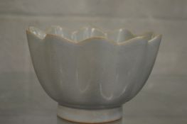 A Chinese celadon petal shaped bowl.