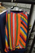 Ladies garments to include colourful striped satin skirt, a denim two piece suit by Escada and a
