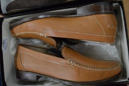 A pair of Unutzer brown leather shoes, size 38.5.