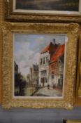 A Continental canal scene with figures and buildings, oil on canvas.