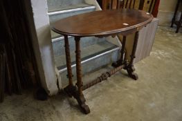 A Victorian stretcher table.