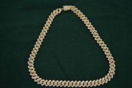 Good quality gilt metal and diamonte heavy weight necklace.