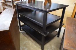 A pair of ebonised two-tier coffee tables.