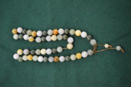 Jade bead necklace.