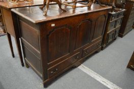 An 18th century oak mule chest.