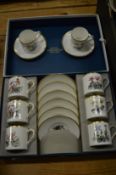Boxed set of Royal Worcester coffee cups and saucers and a pair of similar cups and saucers.