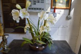 An artificial flower arrangement.