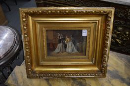 A good small 19th century oil on board, figures in an interior in a gilt frame.