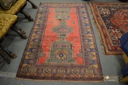 A Belouch rug, 211cm x 124cm.