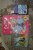 Three children's books to include Barbie, The Jungle Book and Harry Potter and the Chamber of