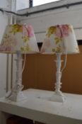 A pair of table lamps.