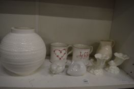 A pair of Royal Worcester miniature Cornucopia vases, a Wedgwood vase, two mugs and other decorative