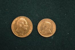 A George IV sovereign, 1832 together with a South African half pond, 1897.