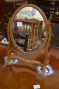 A small mahogany dressing table mirror.