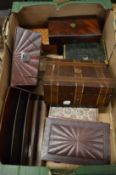 A collection of various wooden and leather boxes.