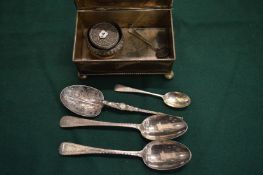 A plated cigarette box containing small items of silver.