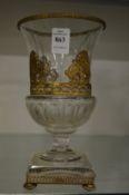 A gilt metal mounted cut glass pedestal vase (chip to corner of one base).