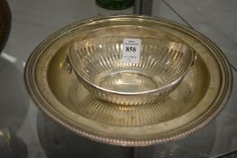 A small Continental silver pierced oval basket together with a circular bowl stamped Stirling,