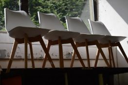 A set of four stylish chairs.