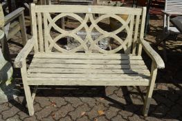 A painted garden bench.