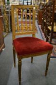 A gilt wood occasional chair.