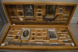 An unusual pair of framed and glazed displays of WWI relics recovered from the British front