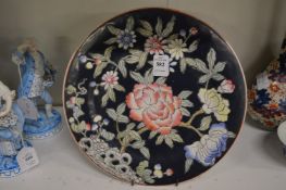 A Chinese floral decorated plate.