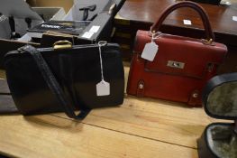 Two ladies handbags.