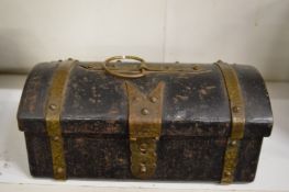 A good metal dome topped casket.