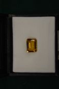 A natural yellow citrine gem stone with certificate.