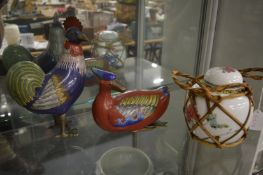 A Chinese ginger jar and two cloisonne birds.
