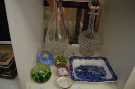 Cut glass decanters, paperweights and a Shredded Wheat bowl.