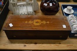 A Victorian music box playing eight airs.