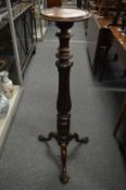 A mahogany tripod jardiniere stand.