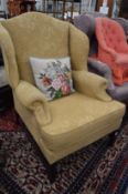 Georgian style wing armchair.