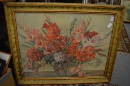 A still life of flowers in a vase, colour print, another picture and two frames.