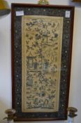 A pair of Chinese silk embroidered pictures.