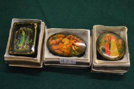 Three various Russian papier mache boxes with original card boxes.