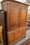 A George III oak linen press.