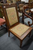 An unusual 19th century rosewood dining chair with removable back panel.