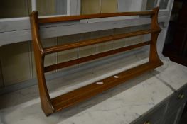 An Ercol plate rack.