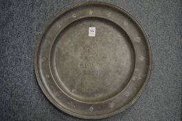 A good large pewter charger, the centre engraved with Britannia.