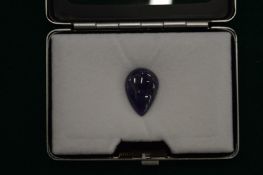 A natural pear shaped tanzanite gem stone with certificate.