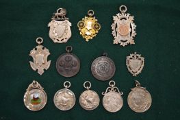 A collection of silver and other medals, late 19th and early 20th century.