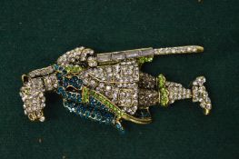 An unusual chess knight gem and diamonte encrusted pendant/brooch.