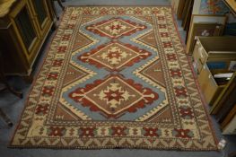 A Turkish carpet, 240cm x 165cm.