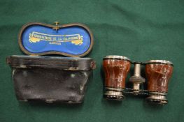 Cased set of opera glasses.