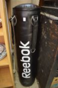 A Reebok punch bag.
