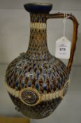 A good Doulton Lambeth jug with moulded decoration.